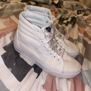 All white slip on vans